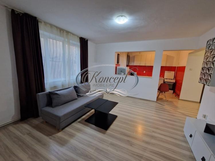 Apartament cu 2 camere semidecomandat, mobilat în Central