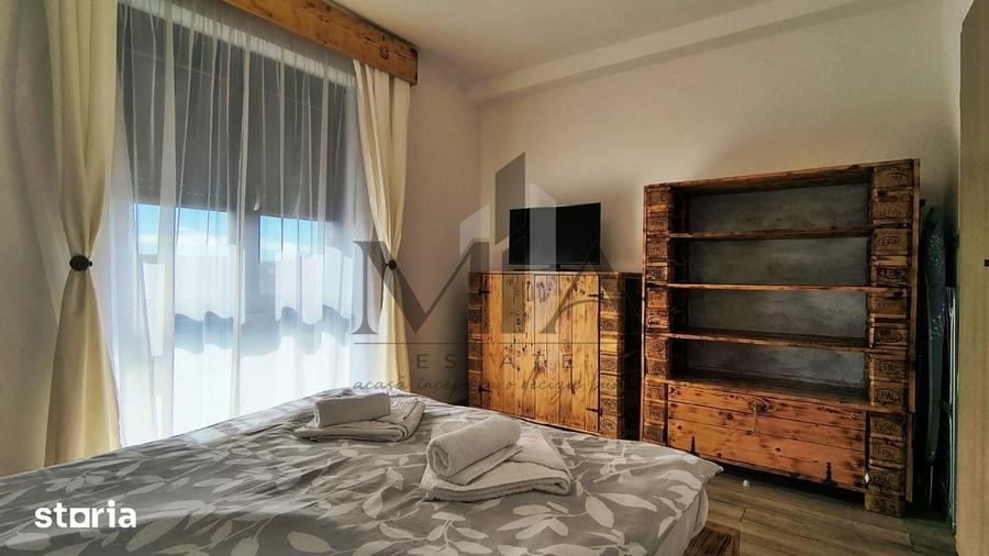 Apartament cu 2 camere decomandat în Sânmartin