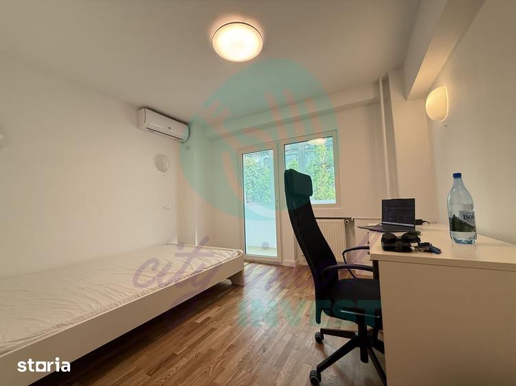 Apartament cu 4 camere decomandat în Romană