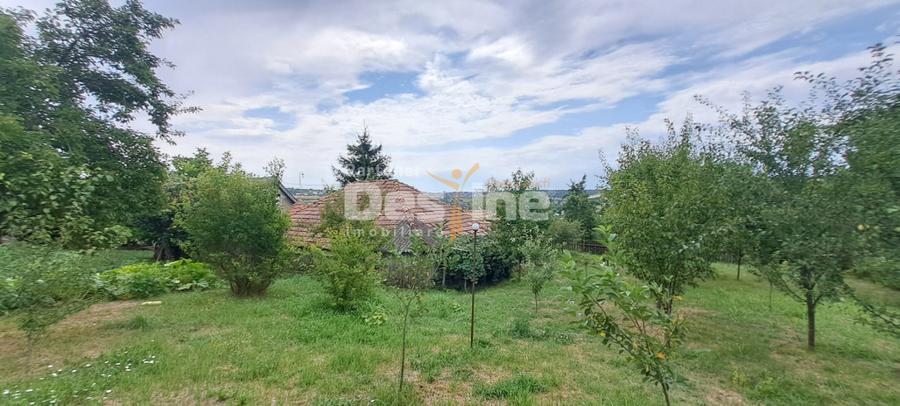 Casă cu 3 camere cu Teren 1715 Mp în Cornești