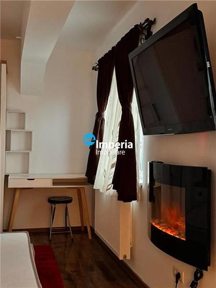 Apartament cu 4 camere decomandat, mobilat în Breazu