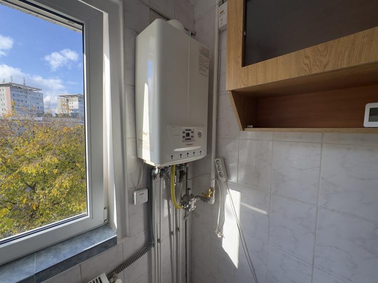 Apartament cu 2 camere semidecomandat, mobilat în Alecu Russo