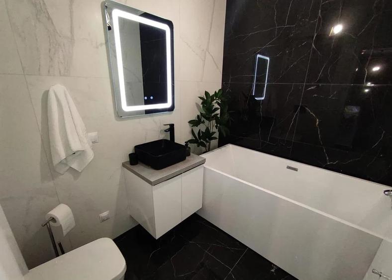 Apartament cu 2 camere semidecomandat, mobilat în Baciu