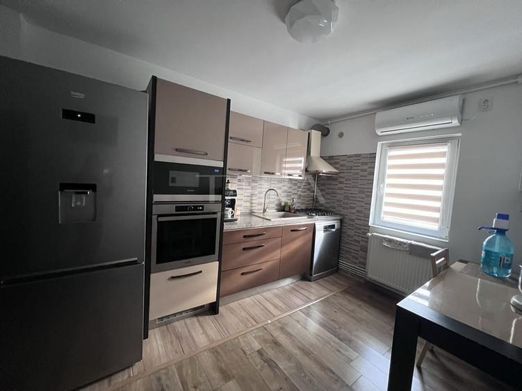 Apartament cu 3 camere decomandat în Mărăști — fotografia 2