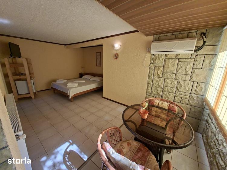Casă cu 9 camere cu Teren 1000 Mp în Central