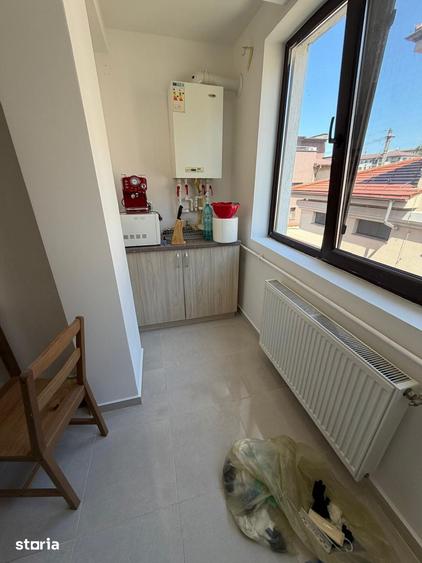 Apartament cu 3 camere decomandat în Titan