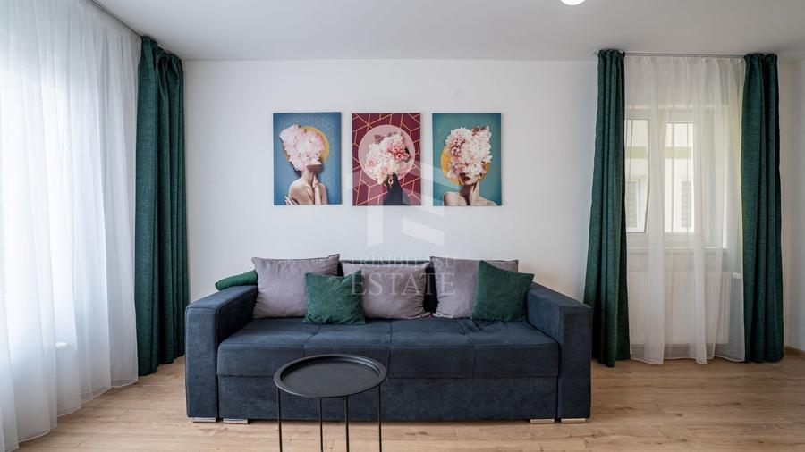Apartament cu 2 camere semidecomandat, mobilat în Tractorul