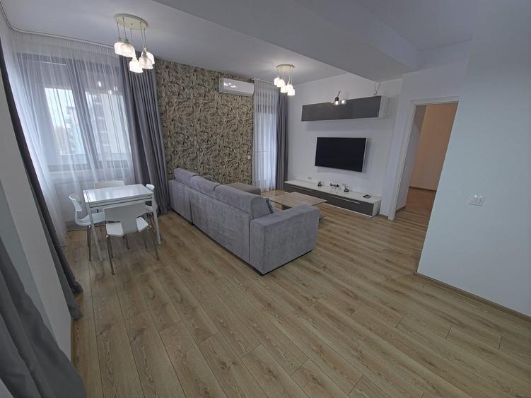 Apartament cu 2 camere semidecomandat, mobilat în Central
