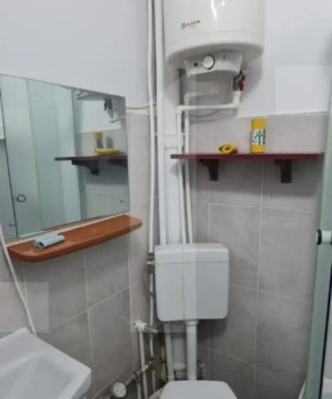 Garsonieră decomandată în Central