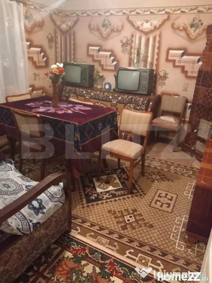 Casă cu 2 camere cu Teren 2000 Mp în Central