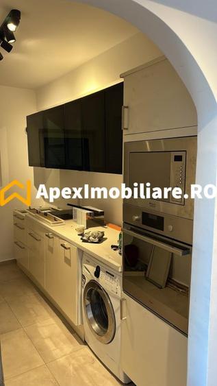 Apartament cu 3 camere semidecomandat în Romană