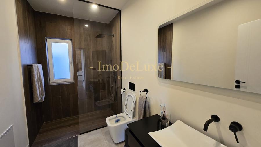 Casă individuală cu 4 camere cu Canalizare în Jucu