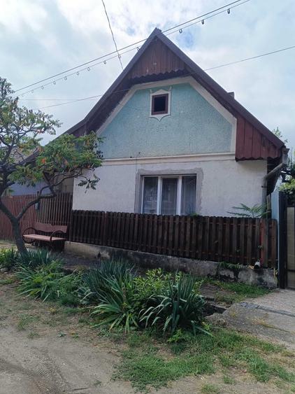 Casă cu 4 camere în Căpușu Mare