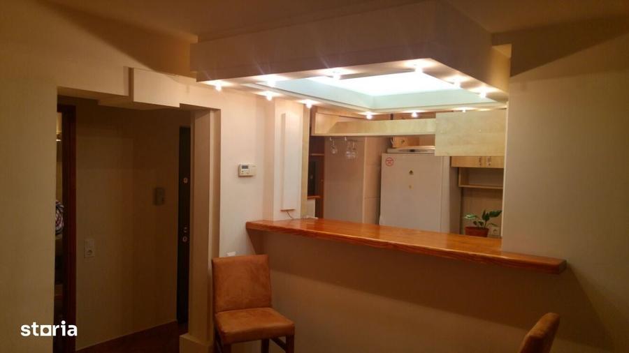 Apartament cu 3 camere semidecomandat în Central
