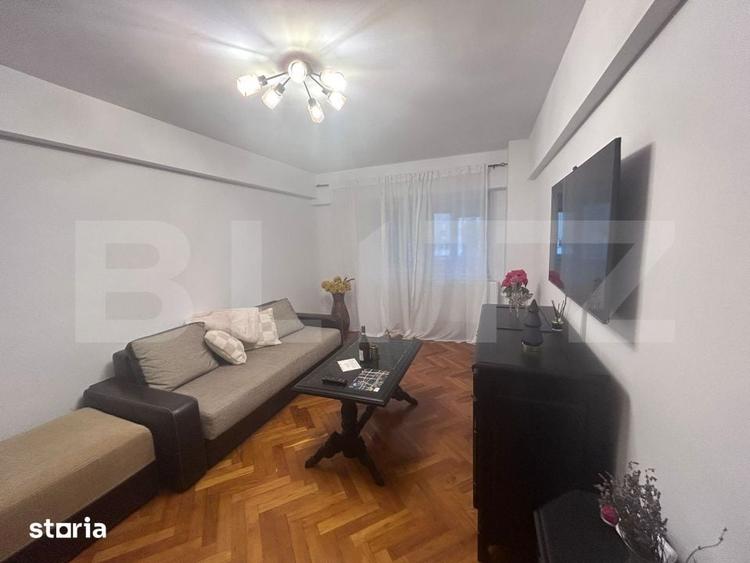 Apartament cu 3 camere decomandat în Calea București