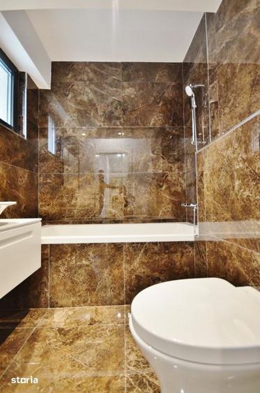 Apartament cu 3 camere semidecomandat în Gara de Nord
