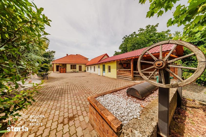 Casă cu Teren 1597 Mp în Ghioroc