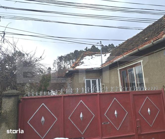 Casă cu 2 camere cu Teren 1400 Mp în Central