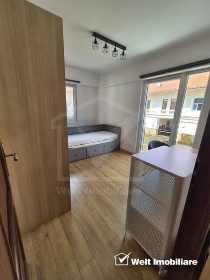 Apartament cu 3 camere semidecomandat, mobilat în Central