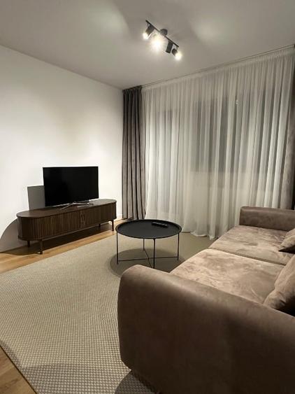 Apartament cu 2 camere semidecomandat, mobilat în Podu Roș