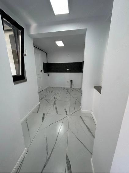 Casă cu 4 camere cu Teren 80 Mp în Central