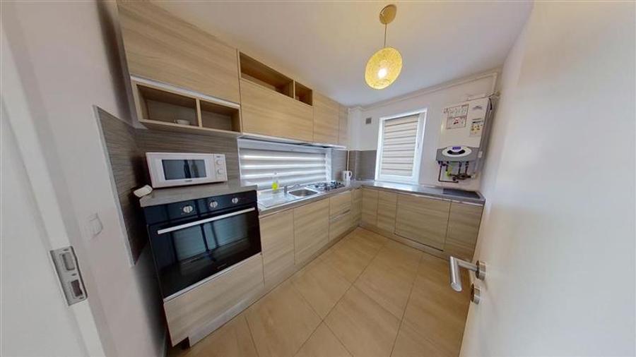 Apartament cu 2 camere decomandat, mobilat în Tractorul