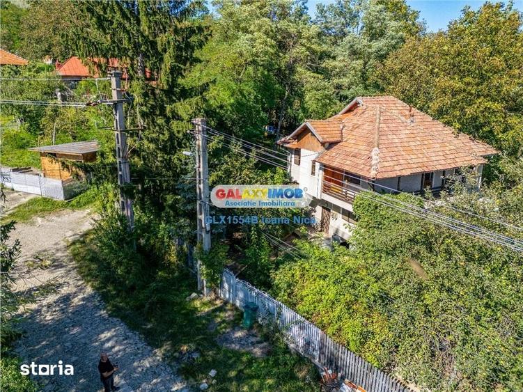 Casă cu 7 camere cu Teren 1000 Mp în Central
