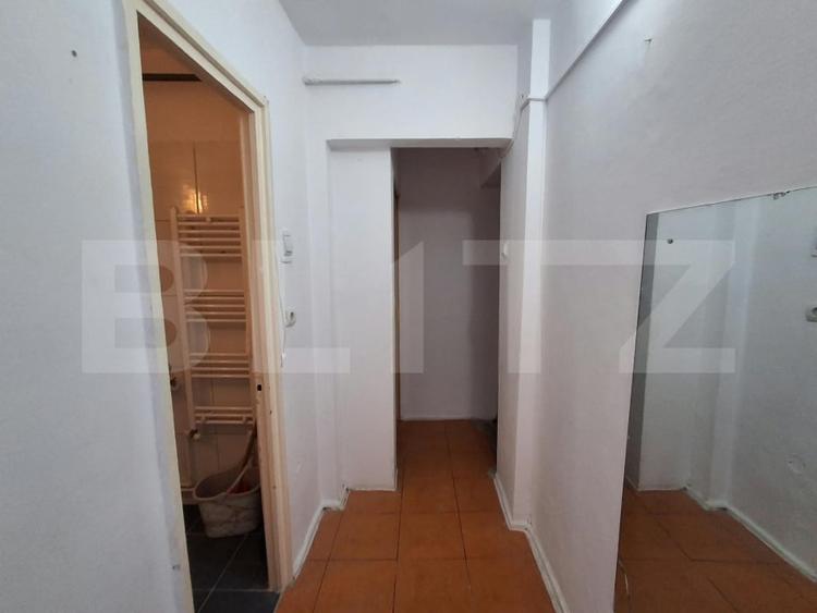 Apartament cu 2 camere semidecomandat, mobilat în Podul de Piatră
