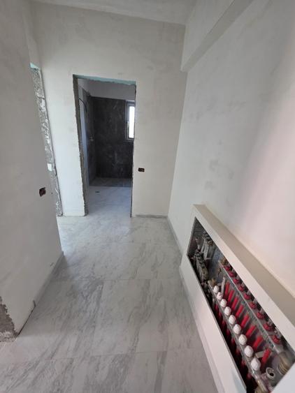 BLOC NOU apartament cu 2 camere 58.7m² de vanzare, ZONA CENTRALA Podu Ros- Bld.S - 10