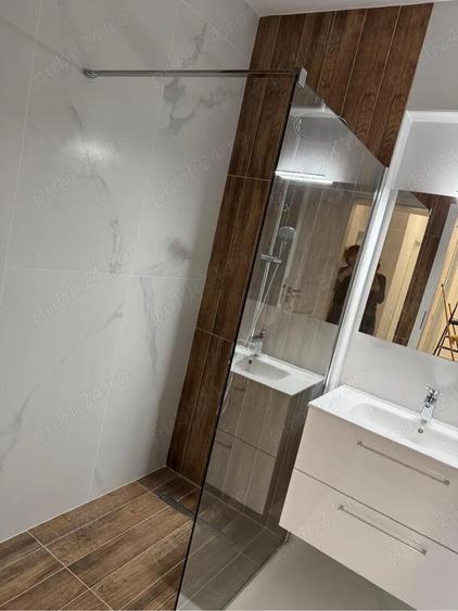 Inchiriez apartament 3 camere bloc nou - 1