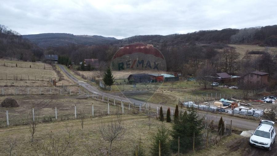 Teren 999 mp. Front 15,70 ml. Valea Garbaului - Floresti - 16