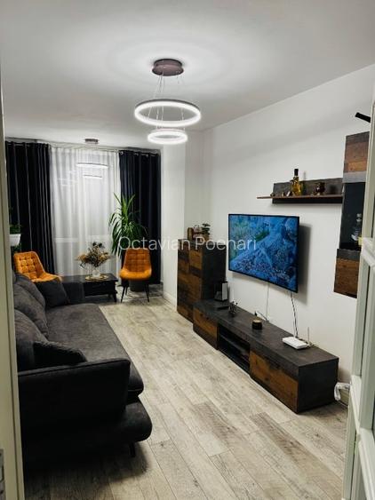Apartament două camere plus loc parcare lunca cetatuii Iași cug