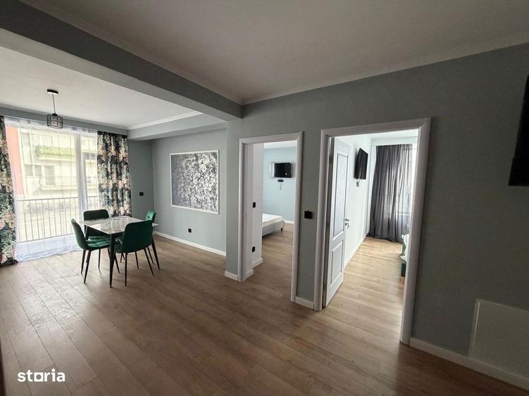 Apartament 2 dormitoare, bucatarie + living - 75 mp, parter - BRADET - 7