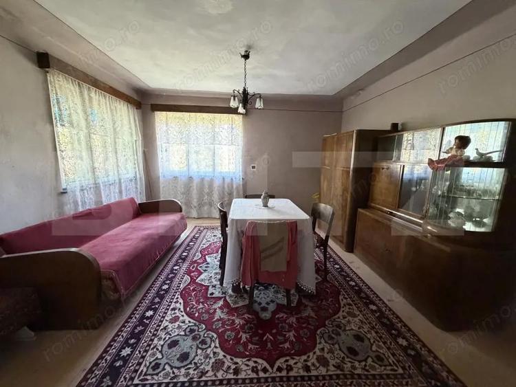 Casa cu 3 camere ?i un teren de 5000 mp - 6