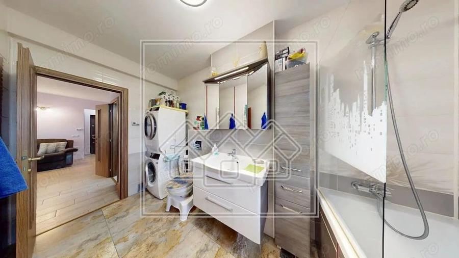 Ap.cu 3 camere, 2 bai si balcon, etaj intermediar, mobilat si utilat - 9