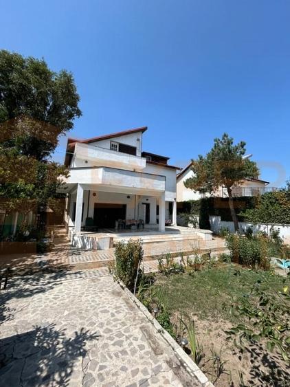 Povestea unei case la doar 200 m de valuri, cu piscina si terasa panoramica - 1