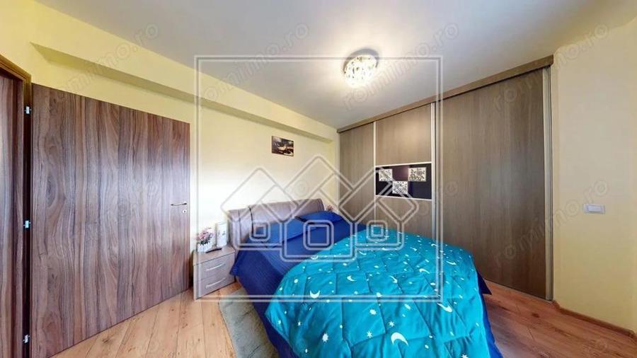 Ap.cu 3 camere, 2 bai si balcon, etaj intermediar, mobilat si utilat - 14