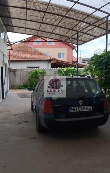 Casă individuală cu 9 camere cu Canalizare în Mărăcineanu