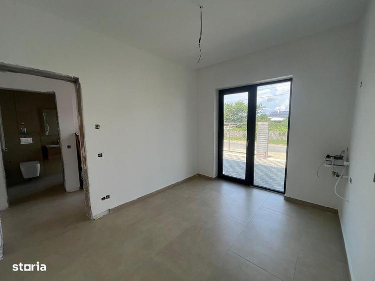 Casă cu 4 camere în Tunari