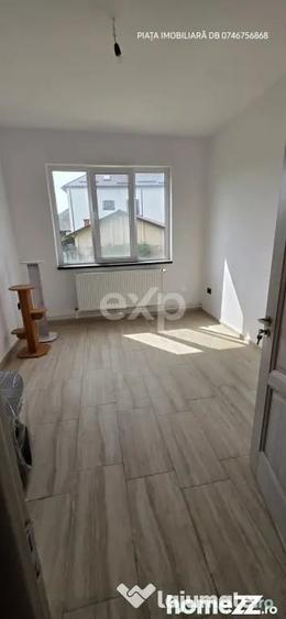 Casă cu 8 camere cu Teren 1388 Mp în Voinești