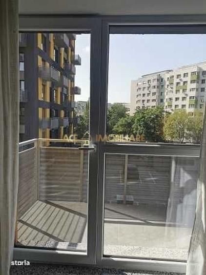 Apartament cu 2 camere semidecomandat, mobilat în Costin Georgian
