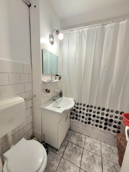 Apartament cu 3 camere decomandat în Calea București