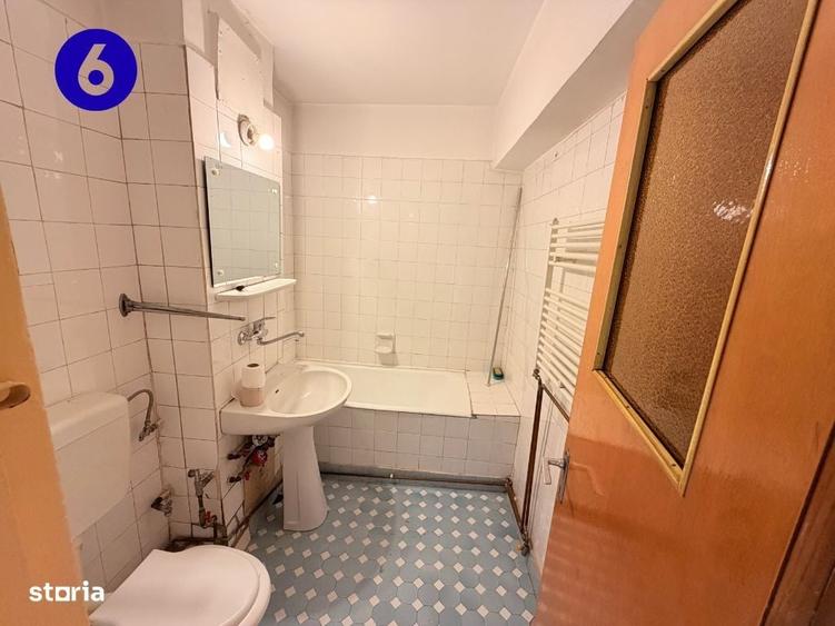Apartament cu 3 camere decomandat în Calea București