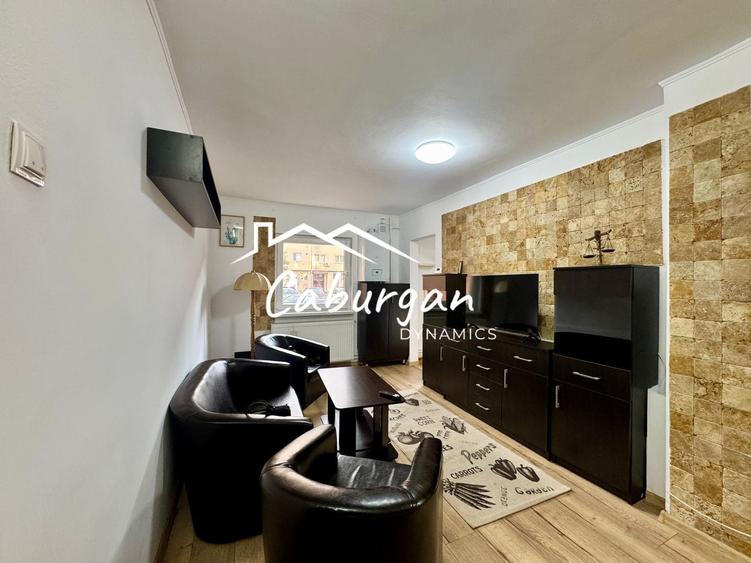 Apartament cu 3 camere semidecomandat, mobilat în Central