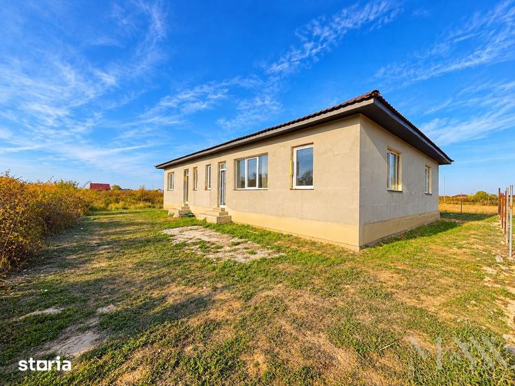 Casă cu 4 camere cu Teren 553 Mp în Sânmartin
