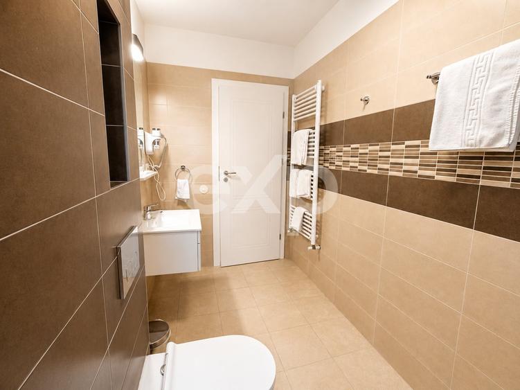 Apartament cu 2 camere semidecomandat, mobilat în Borhanci
