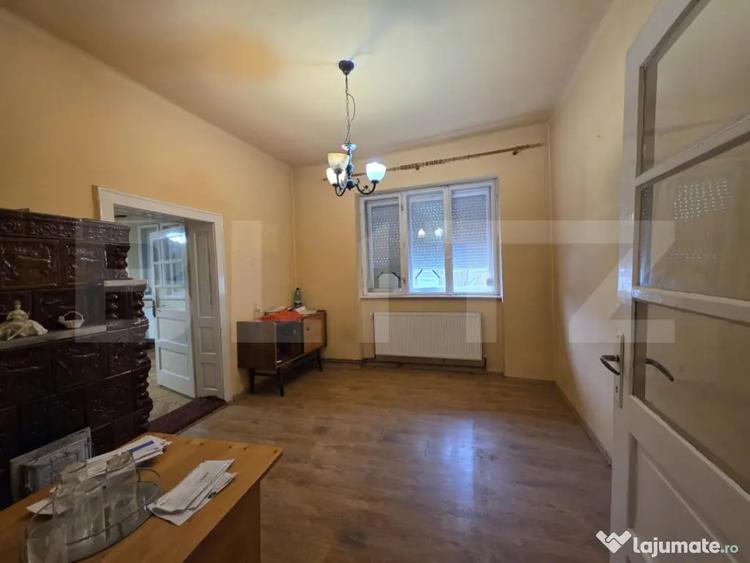 Casă cu 4 camere cu Teren 500 Mp în Titulescu