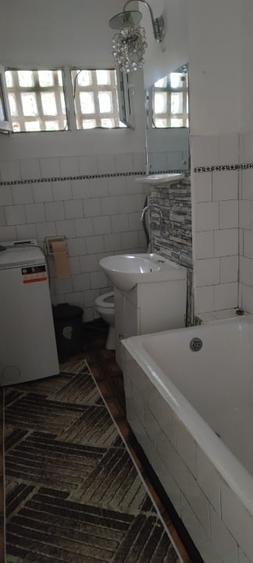 Apartament cu 2 camere semidecomandat în Podu Roș