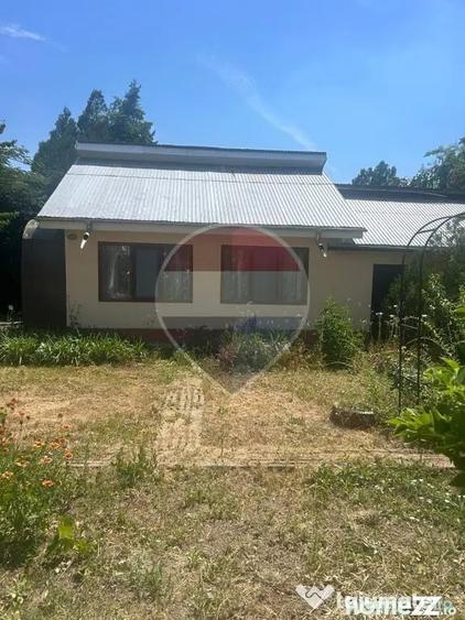Casă cu 5 camere cu Teren 1129 Mp în Cunești