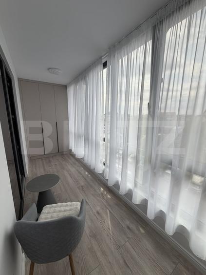Garsonieră decomandată, mobilată în